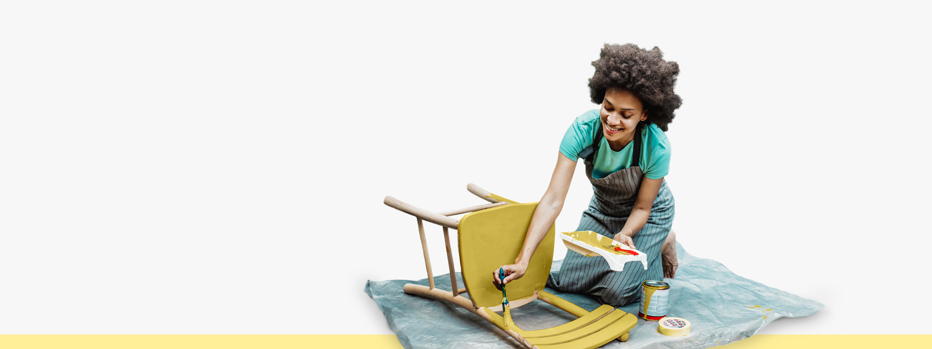 women painting chair