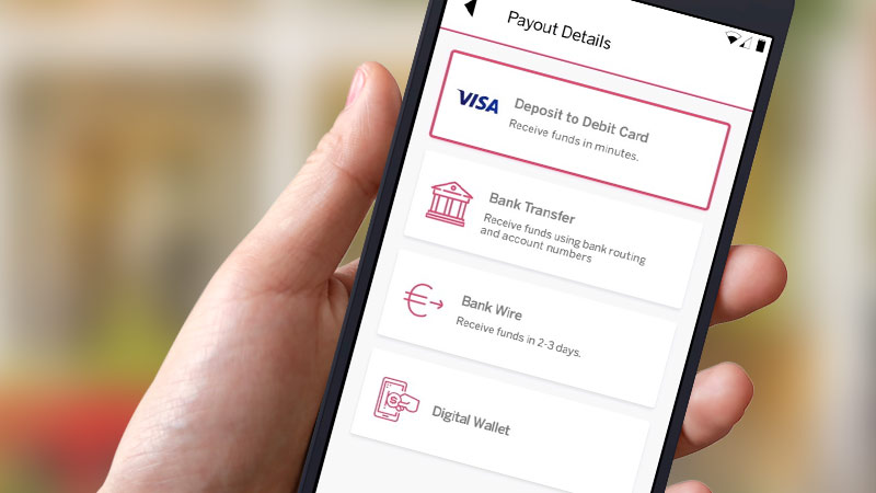 A closeup of a phone screen with Visa Direct payout options. 